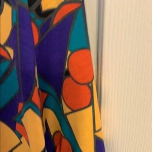 This is a Tunic Top mostly mustard color.